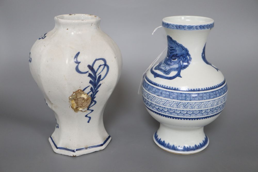 A Chinese blue and white vase and a Delft vase, height 21cm
